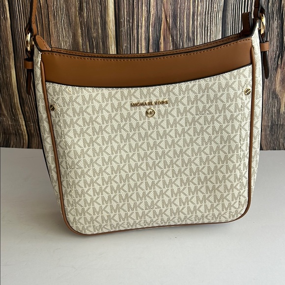 Michael Kors Handbags - Michael Kors Brown Jet Set Charm Large North/South Top Zip Crossbody